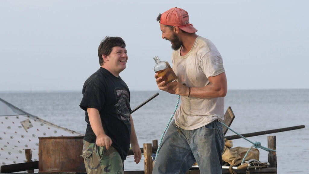 Zack Gottsagen, an actor with Down's syndrome, plays Zak in The Peanut Butter Falcon. Image credit: Netflix/ Tudum
